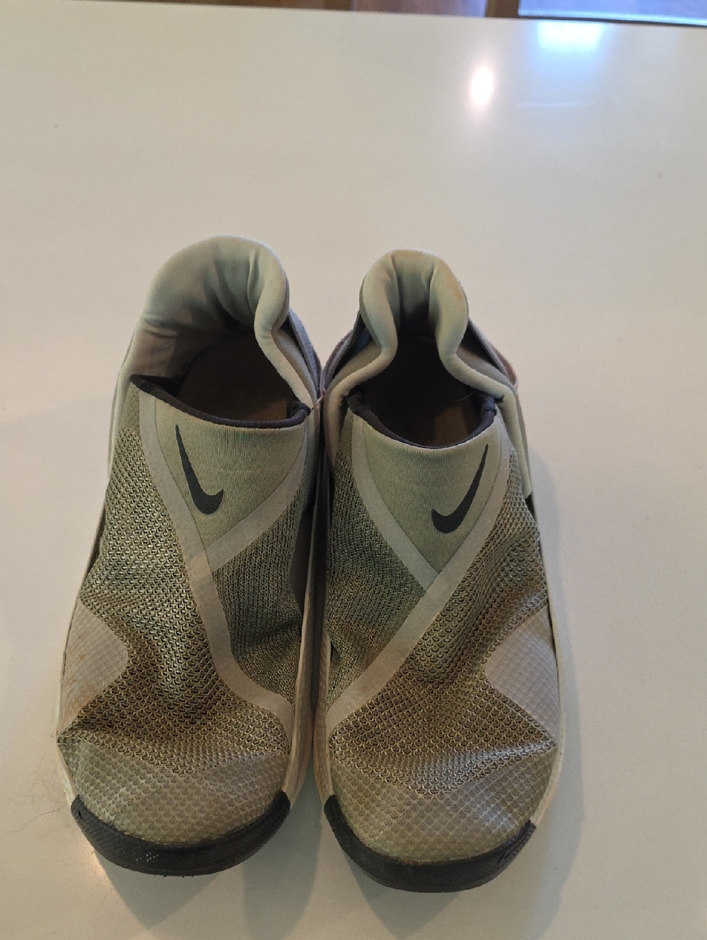 Nike Slip-On Trainers in Olive and Beige with Black Swoosh